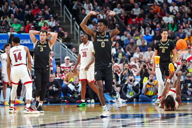 Mar 23, 2024; Pittsburgh, PA, USA; North Carolina State Wolfpack guard DJ Horne (0) reacts after being called for a foul during overtime of the game against the North Carolina State Wolfpack in the second round of the 2024 NCAA Tournament at PPG Paints Arena. Mandatory Credit: Gregory Fisher-USA TODAY Sports