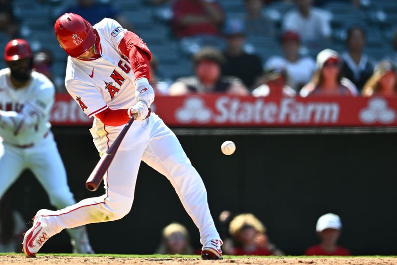 Aug 3, 2025; Anaheim, California, USA; Los Angeles Angels outfielder Taylor Ward (3) hits a 3-run walk-off home run to win against the Chicago White Sox during the ninth inning at Angel Stadium. Mandatory Credit: Jonathan Hui-Imagn Images