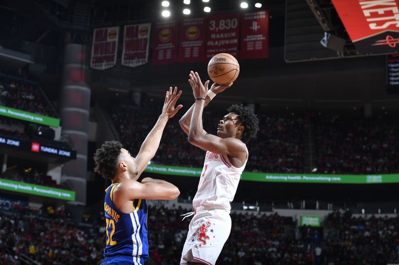 HOUSTON, TX - APRIL 4: Amen Thompson #1 of the Houston Rockets shoots the ball during the game against the Golden State Warriors on April 4, 2024 at the Toyota Center in Houston, Texas. NOTE TO USER: User expressly acknowledges and agrees that, by downloading and or using this photograph, User is consenting to the terms and conditions of the Getty Images License Agreement. Mandatory Copyright Notice: Copyright 2024 NBAE (Photo by Logan Riely/NBAE via Getty Images)