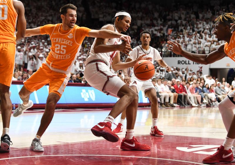 Mar 2, 2024; Tuscaloosa, Alabama, USA;  Tennessee guard Santiago Vescovi (25) knocks the ball away from Alabama forward Jarin Stevenson (15) at Coleman Coliseum.  Mandatory Credit: Gary Cosby Jr.-USA TODAY Sports