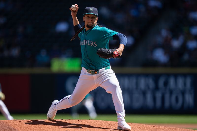 Jul 24, 2024; Seattle, Washington, USA;  Seattle Mariners starter Luis Castillo (58) delivers a pitch during the first inning against the Los Angeles Angelsat T-Mobile Park. Mandatory Credit: Stephen Brashear-USA TODAY Sports