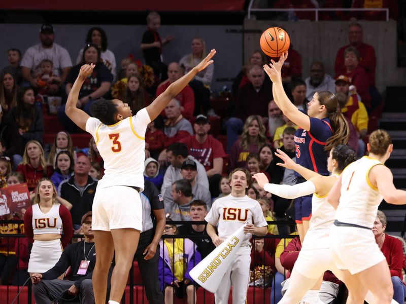 Jan 24, 2026; Ames, Iowa, USA;  Arizona Wildcats guard Sumayah Sugapong (3) defends the shot from Arizona Wildcats guard Molly Ladwig (5) during the first half at James H. Hilton Coliseum. Mandatory Credit: Reese Strickland-Imagn Images