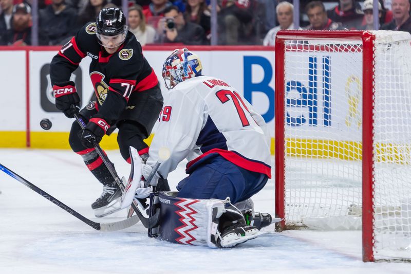 Jan 30, 2025; Ottawa, Ontario, CAN; Washington Capitals goalie Charlie Lindgren (79) makes a save on a shot from Ottawa Senators center Ridly Greig (71) in the first period at the Canadian Tire Centre. Mandatory Credit: Marc DesRosiers-Imagn Images