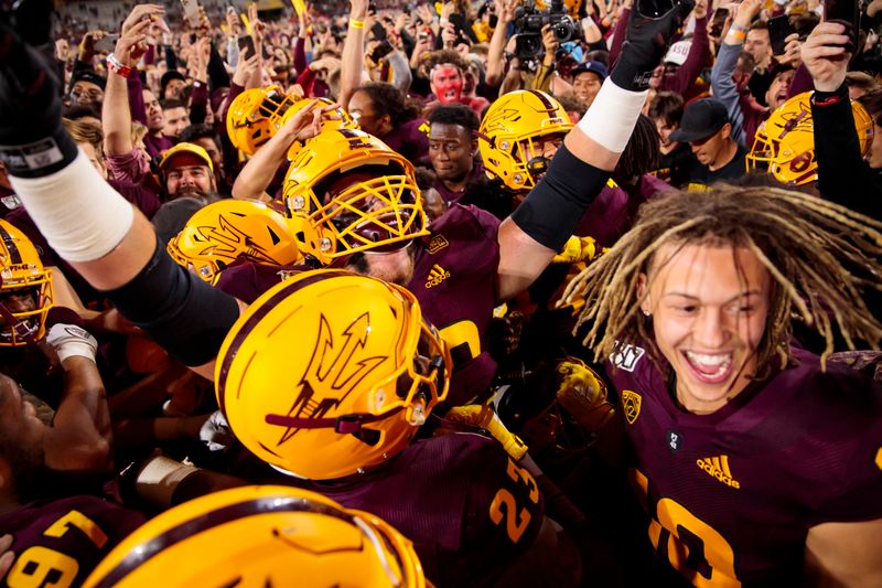 Nov 23, 2019; Tempe, AZ, USA; Arizona State Sun Devils players celebrate after defeating the Oregon Ducks at Sun Devil Stadium. Mandatory Credit: Mark J. Rebilas-USA TODAY Sports