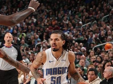 MILWAUKEE, WI - DECEMBER 21:  Cole Anthony #50 of the Orlando Magic handles the ball during the game against the Milwaukee Bucks on December 21, 2023 at the Fiserv Forum Center in Milwaukee, Wisconsin. NOTE TO USER: User expressly acknowledges and agrees that, by downloading and or using this Photograph, user is consenting to the terms and conditions of the Getty Images License Agreement. Mandatory Copyright Notice: Copyright 2023 NBAE (Photo by Gary Dineen/NBAE via Getty Images).