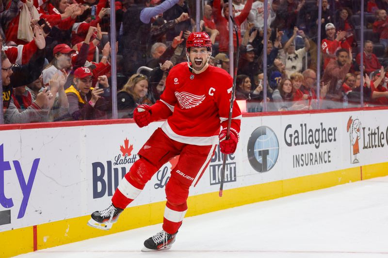 Nov 2, 2024; Detroit, Michigan, USA; Detroit Red Wings center Dylan Larkin (71) celebrates a goal in the second period of the game against the Buffalo Sabres at Little Caesars Arena. Mandatory Credit: Brian Bradshaw Sevald-Imagn Images