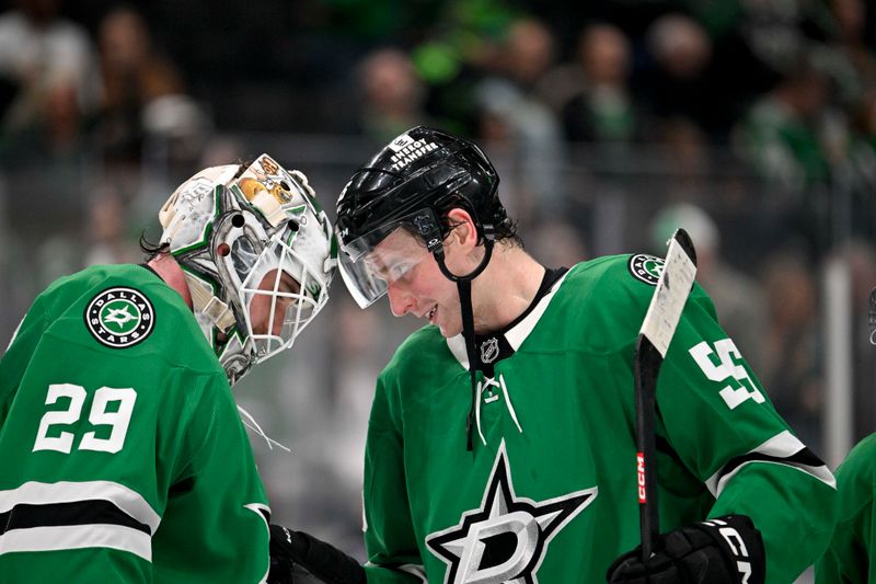 Jan 31, 2025; Dallas, Texas, USA; Dallas Stars goaltender Jake Oettinger (29) and defenseman Thomas Harley (55) celebrate on the ice after the Stars defeat the Vancouver Canucks at the American Airlines Center. Mandatory Credit: Jerome Miron-Imagn Images