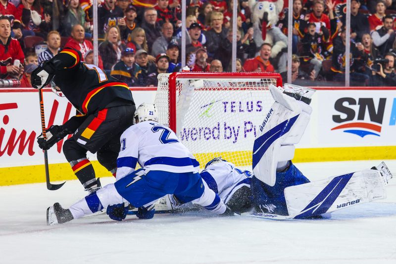 Jan 21, 2023; Calgary, Alberta, CAN; Calgary Flames right wing Tyler Toffoli (73) scores a goal against Tampa Bay Lightning goaltender Andrei Vasilevskiy (88) during the second period at Scotiabank Saddledome. Mandatory Credit: Sergei Belski-USA TODAY Sports