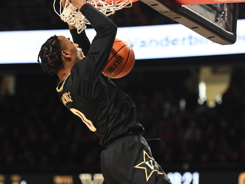 Jan 14, 2023; Nashville, Tennessee, USA; Vanderbilt Commodores guard Tyrin Lawrence (0) dunks the ball against the Arkansas Razorbacks during the first half at Memorial Gymnasium. Mandatory Credit: Christopher Hanewinckel-USA TODAY Sports