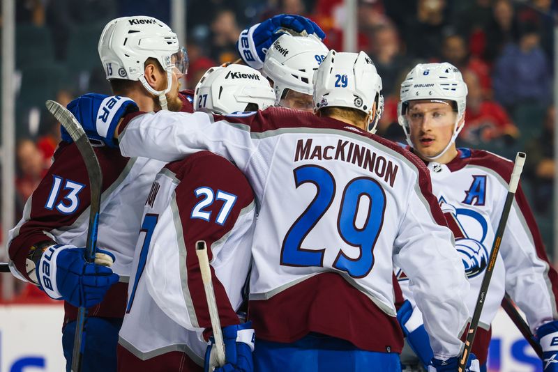 Mar 12, 2024; Calgary, Alberta, CAN; Colorado Avalanche right wing Mikko Rantanen (96) celebrates his goal with teammates against the Calgary Flames during the first period at Scotiabank Saddledome. Mandatory Credit: Sergei Belski-USA TODAY Sports