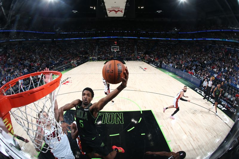 NEW ORLEANS, LA - FEBRUARY 23: Herb Jones #5 of the New Orleans Pelicans drives to the basket during the game against the Miami Heat on February 23, 2024 at the Smoothie King Center in New Orleans, Louisiana. NOTE TO USER: User expressly acknowledges and agrees that, by downloading and or using this Photograph, user is consenting to the terms and conditions of the Getty Images License Agreement. Mandatory Copyright Notice: Copyright 2024 NBAE (Photo by Layne Murdoch Jr./NBAE via Getty Images)