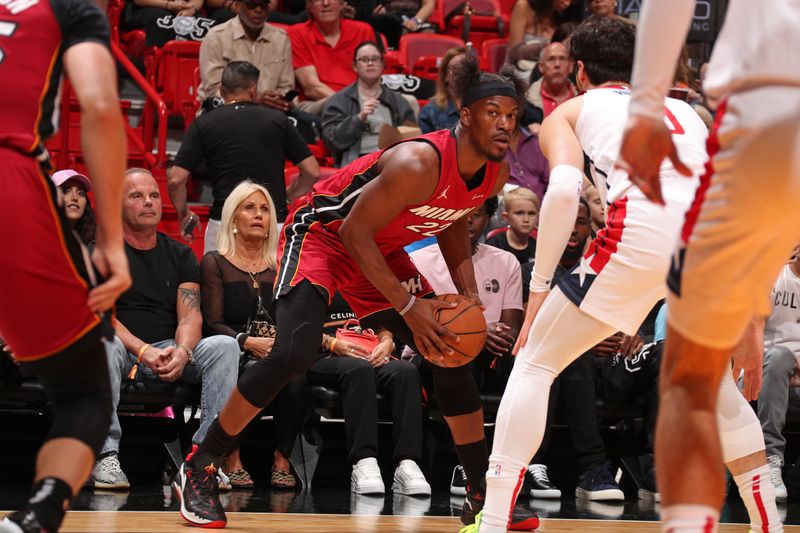 MIAMI, FL - MARCH 10: Jimmy Butler #22 of the Miami Heat looks on during the game against the Washington Wizards on March 10, 2024 at Kaseya Center in Miami, Florida. NOTE TO USER: User expressly acknowledges and agrees that, by downloading and or using this Photograph, user is consenting to the terms and conditions of the Getty Images License Agreement. Mandatory Copyright Notice: Copyright 2024 NBAE (Photo by Issac Baldizon/NBAE via Getty Images)