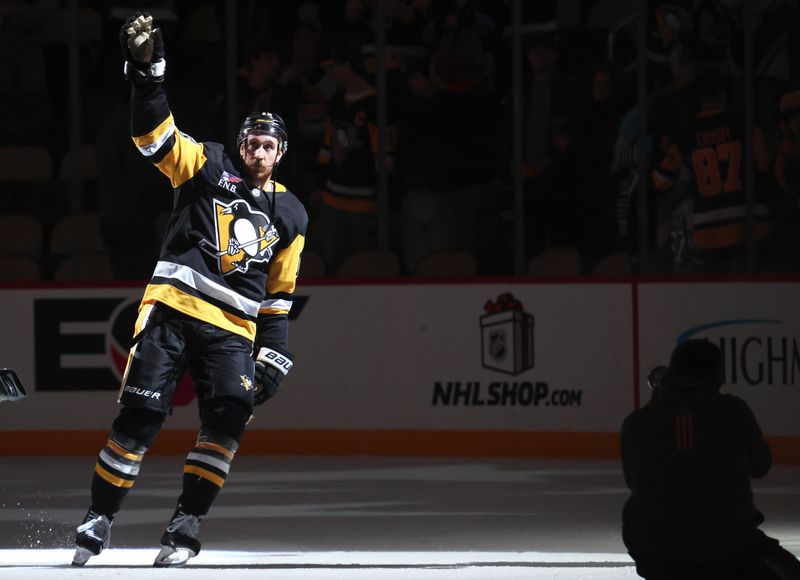 Nov 26, 2025; Pittsburgh, Pennsylvania, USA; Pittsburgh Penguins right wing Kevin Hayes (13) reacts after being named first star of the game against the Buffalo Sabres at PPG Paints Arena. Mandatory Credit: Charles LeClaire-Imagn Images