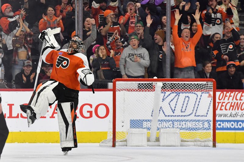 Jan 10, 2024; Philadelphia, Pennsylvania, USA; Philadelphia Flyers goaltender Samuel Ersson (33) celebrates after making the final save during the shootout in win against the Montreal Canadiens at Wells Fargo Center. Mandatory Credit: Eric Hartline-USA TODAY Sports