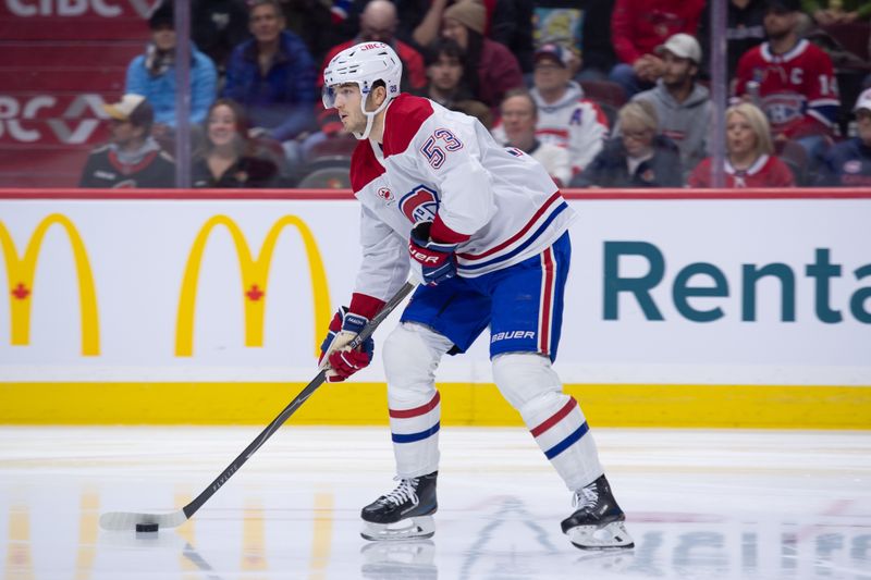 Jan 17, 2026; Ottawa, Ontario, CAN; Montreal Canadiens defenseman Noah Dobson (53) controls the puck in the first period against the  Ottawa Senators at the Canadian Tire Centre. Mandatory Credit: Marc DesRosiers-IMAGN Images