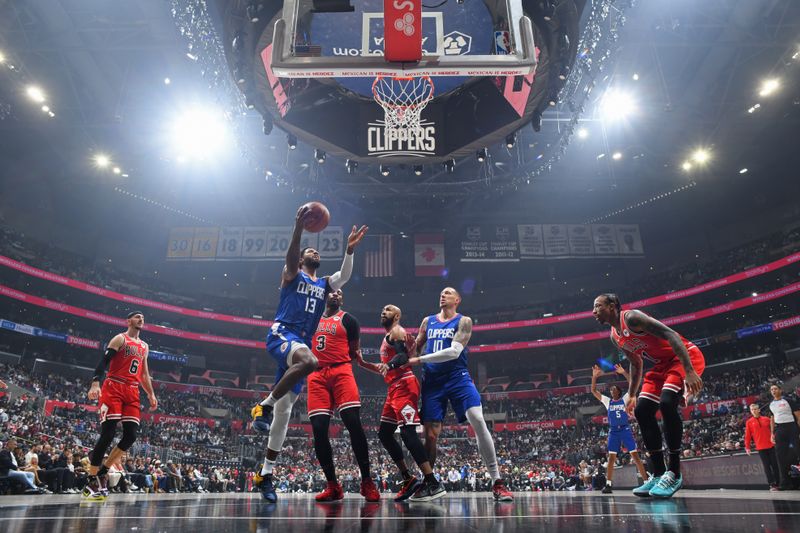 LOS ANGELES, CA - MARCH 9: Paul George #13 of the LA Clippers shoots the ball during the game against the Chicago Bulls on March 9, 2024 at Crypto.Com Arena in Los Angeles, California. NOTE TO USER: User expressly acknowledges and agrees that, by downloading and/or using this Photograph, user is consenting to the terms and conditions of the Getty Images License Agreement. Mandatory Copyright Notice: Copyright 2024 NBAE (Photo by Adam Pantozzi/NBAE via Getty Images)