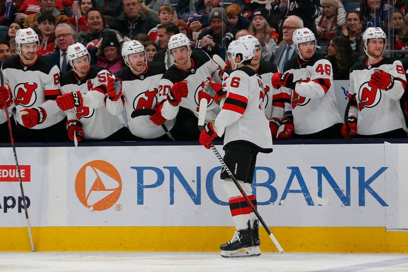 Jan 19, 2024; Columbus, Ohio, USA; New Jersey Devils defenseman John Marino (6) celebrates his goal against the Columbus Blue Jackets during the second period at Nationwide Arena. Mandatory Credit: Russell LaBounty-USA TODAY Sports