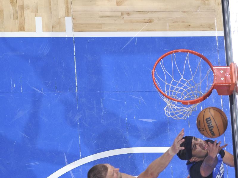 ORLANDO, FL - APRIL 25: Anthony Black #0 of the Orlando Magic shoots the ball during Round One, Game Three of the 2025 NBA Playoffs on April 25, 2025 at Kia Center in Orlando, Florida. NOTE TO USER: User expressly acknowledges and agrees that, by downloading and or using this photograph, User is consenting to the terms and conditions of the Getty Images License Agreement. Mandatory Copyright Notice: Copyright 2025 NBAE (Photo by Fernando Medina/NBAE via Getty Images)