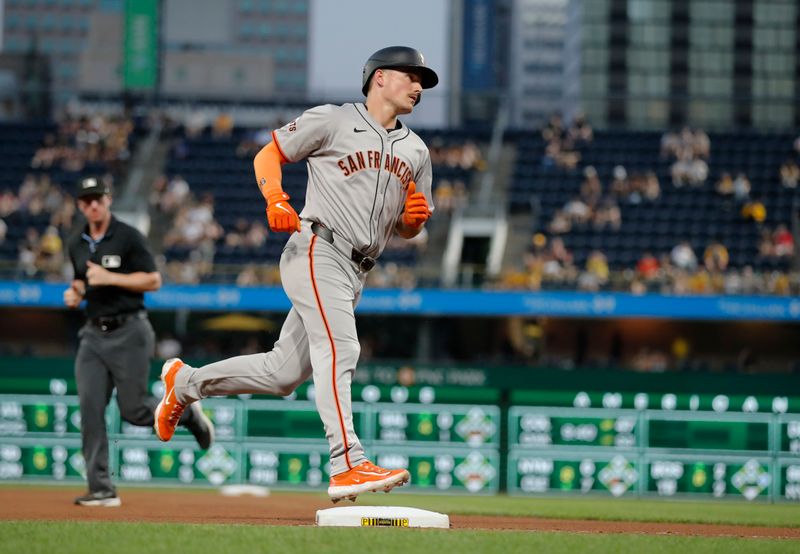 May 21, 2024; Pittsburgh, Pennsylvania, USA;  San Francisco Giants third baseman Matt Chapman (26) circles the bases on a solo home run against the Pittsburgh Pirates during the seventh inning at PNC Park. Mandatory Credit: Charles LeClaire-USA TODAY Sports