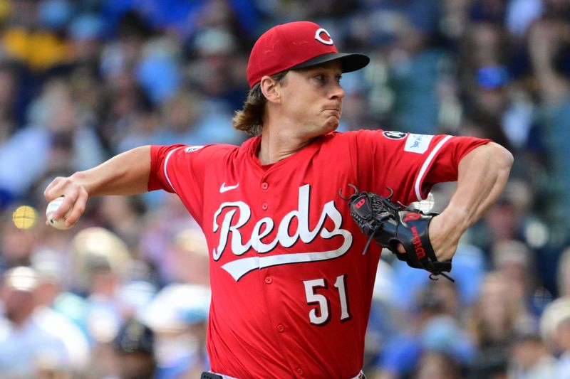 Sep 28, 2025; Milwaukee, Wisconsin, USA;  Cincinnati Reds starting pitcher Brady Singer (51) throws against the Milwaukee Brewers in the first inning at American Family Field. Mandatory Credit: Benny Sieu-Imagn Images