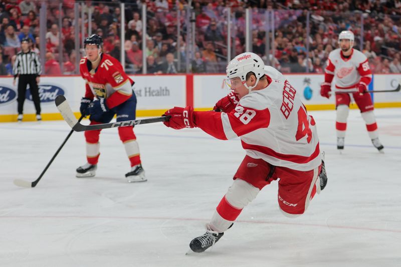 Jan 16, 2025; Sunrise, Florida, USA; Detroit Red Wings right wing Jonatan Berggren (48) scores against the Florida Panthers during the first period at Amerant Bank Arena. Mandatory Credit: Sam Navarro-Imagn Images