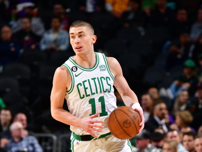 PHOENIX, AZ - DECEMBER 7: Payton Pritchard #11 of the Boston Celtics dribbles the ball during the game against the Phoenix Suns on December 7, 2022 at Footprint Center in Phoenix, Arizona. NOTE TO USER: User expressly acknowledges and agrees that, by downloading and or using this photograph, user is consenting to the terms and conditions of the Getty Images License Agreement. Mandatory Copyright Notice: Copyright 2022 NBAE (Photo by Barry Gossage/NBAE via Getty Images)