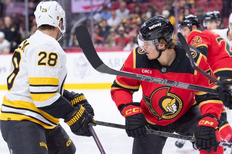 Oct 27, 2025; Ottawa, Ontario, CAN; Boston Bruins center Elias Lindholm (28) and Ottawa Senators center Ridly Greig (71) follow the puck after a faceoff in the second period at the Canadian Tire Centre. Mandatory Credit: Marc DesRosiers-IMAGN Images