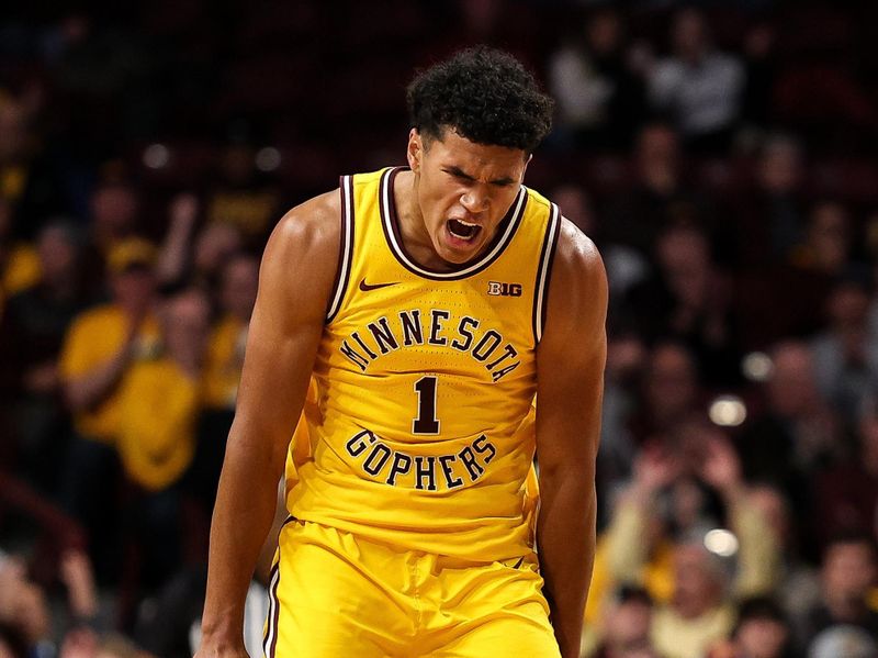 Dec 3, 2025; Minneapolis, Minnesota, USA; Minnesota Golden Gophers guard Isaac Asuma (1) celebrates his three point basket against the Indiana Hoosiers during the second half at Williams Arena. Mandatory Credit: Matt Krohn-Imagn Images