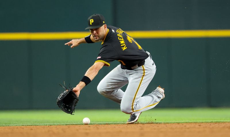 Aug 20, 2024; Arlington, Texas, USA; Pittsburgh Pirates shortstop Isiah Kiner-Falefa (7) cannot field a ball during the sixth inning against the Texas Rangers  at Globe Life Field. Mandatory Credit: Kevin Jairaj-USA TODAY Sports