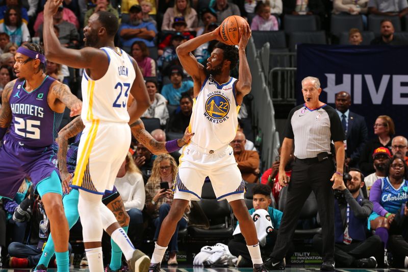 CHARLOTTE, NC -OCTOBER 29: Andrew Wiggins #22 of the Golden State Warriors handles the ball during the game against the Charlotte Hornets on October 29, 2022 at Spectrum Center in Charlotte, North Carolina. NOTE TO USER: User expressly acknowledges and agrees that, by downloading and or using this photograph, User is consenting to the terms and conditions of the Getty Images License Agreement. Mandatory Copyright Notice: Copyright 2022 NBAE (Photo by Kent Smith/NBAE via Getty Images)