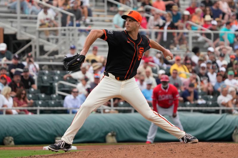 Feb 26, 2024; Scottsdale, Arizona, USA; San Francisco Giants relief pitcher Taylor Rogers (33) throws against the Los Angeles Angels  in the third inning at Scottsdale Stadium. Mandatory Credit: Rick Scuteri-USA TODAY Sports