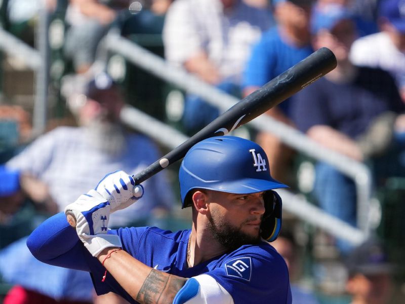Mar 3, 2026; Goodyear, Arizona, USA; Los Angeles Dodgers left fielder Andy Pages (44) bats against the Cleveland Guardians during the first inning at Goodyear Ballpark. Mandatory Credit: Joe Camporeale-Imagn Images