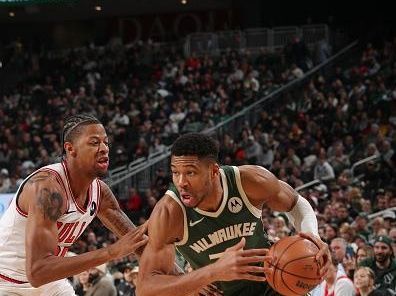 MILWAUKEE, WI - DECEMBER 11:  Giannis Antetokounmpo #34 of the Milwaukee Bucks goes to the basket during the game on December 11, 2023 at the Fiserv Forum Center in Milwaukee, Wisconsin. NOTE TO USER: User expressly acknowledges and agrees that, by downloading and or using this Photograph, user is consenting to the terms and conditions of the Getty Images License Agreement. Mandatory Copyright Notice: Copyright 2023 NBAE (Photo by Gary Dineen/NBAE via Getty Images).