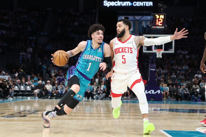 CHARLOTTE, NC - JANUARY 26:  LaMelo Ball #1 of the Charlotte Hornets drives to the basket during the game as Fred VanVleet #5 of the Houston Rockets plays defense on January 26, 2024 at Spectrum Center in Charlotte, North Carolina. NOTE TO USER: User expressly acknowledges and agrees that, by downloading and or using this photograph, User is consenting to the terms and conditions of the Getty Images License Agreement.  Mandatory Copyright Notice:  Copyright 2024 NBAE (Photo by Brock Williams-Smith/NBAE via Getty Images)