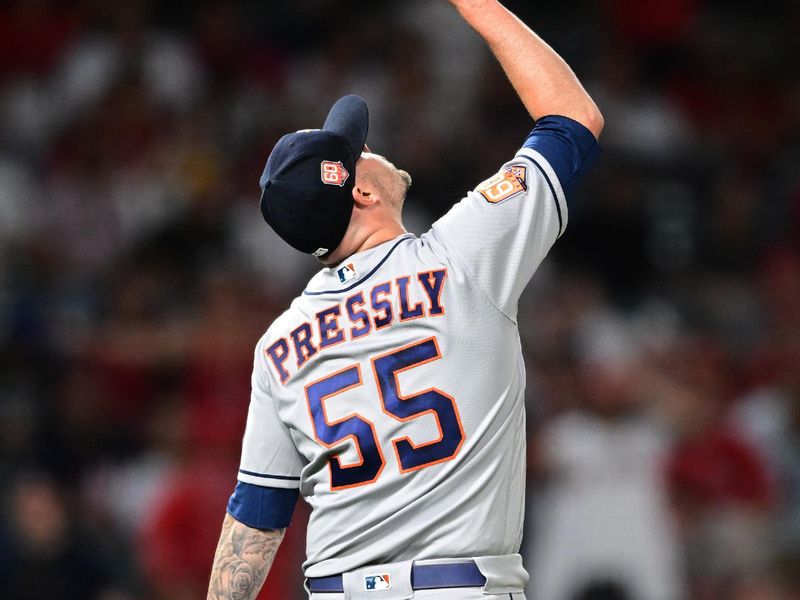 Apr 7, 2022; Anaheim, California, USA; Houston Astros relief pitcher Ryan Pressly (55) points to the sky after the final out of the ninth inning defeating the Los Angeles Angels at Angel Stadium. Mandatory Credit: Jayne Kamin-Oncea-USA TODAY Sports