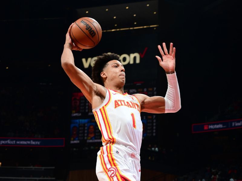 ATLANTA, GA - APRIL 3: Jalen Johnson #1 of the Atlanta Hawks drives to the basket during the game against the Detroit Pistons on April 3, 2024 at State Farm Arena in Atlanta, Georgia.  NOTE TO USER: User expressly acknowledges and agrees that, by downloading and/or using this Photograph, user is consenting to the terms and conditions of the Getty Images License Agreement. Mandatory Copyright Notice: Copyright 2024 NBAE (Photo by Scott Cunningham/NBAE via Getty Images)