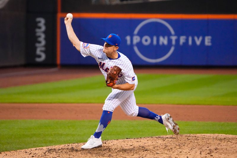 Jul 16, 2023; New York City, New York, USA; New York Mets pitcher David Robertson (30) delivers a pitch against the Los Angeles Dodgers during the ninth inning at Citi Field. Mandatory Credit: Gregory Fisher-USA TODAY Sports