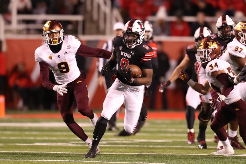 Oct 16, 2021; Salt Lake City, Utah, USA; Utah Utes running back Tavion Thomas (9) runs with he ball during the third quarter against the Arizona State Sun Devils at Rice-Eccles Stadium. Mandatory Credit: Rob Gray-USA TODAY Sports