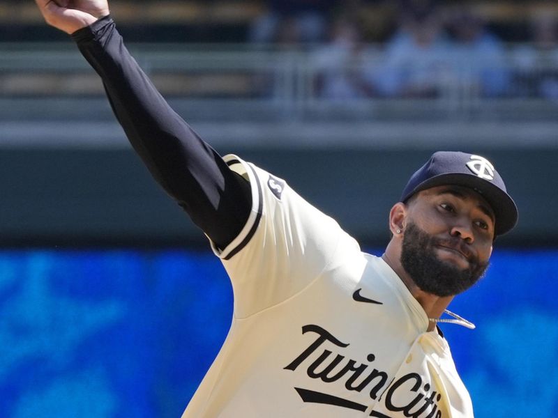 Apr 13, 2025; Minneapolis, Minnesota, USA; Minnesota Twins starting pitcher Simeon Woods Richardson (24) throws to the Detroit Tigers in the first inning at Target Field. Mandatory Credit: Bruce Kluckhohn-Imagn Images