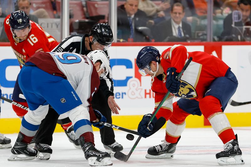 Feb 11, 2023; Sunrise, Florida, USA; Colorado Avalanche center Nathan MacKinnon (29) and Florida Panthers center Sam Reinhart (13) face-off during the second period at FLA Live Arena. Mandatory Credit: Sam Navarro-USA TODAY Sports