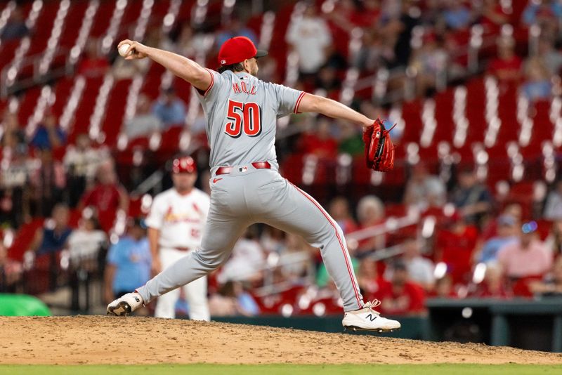 Jun 27, 2024; St. Louis, Missouri, USA; Cincinnati Reds pitcher Sam Moll (50) pitches against the St. Louis Cardinals in the ninth inning at Busch Stadium. Mandatory Credit: Zach Dalin-USA TODAY Sports