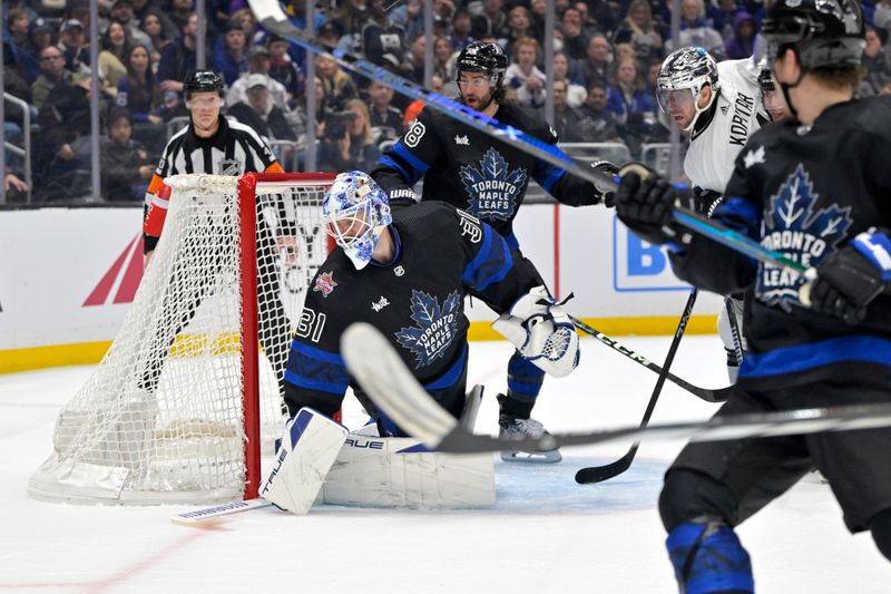 Jan 2, 2024; Los Angeles, California, USA; Toronto Maple Leafs goaltender Martin Jones (31) makes a save in the second period against the Los Angeles Kings at Crypto.com Arena. Mandatory Credit: Jayne Kamin-Oncea-USA TODAY Sports