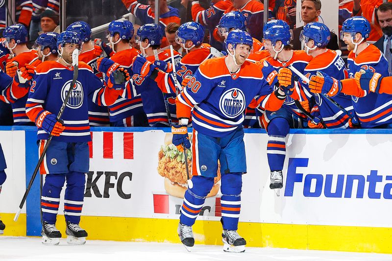 Jan 27, 2025; Edmonton, Alberta, CAN; The Edmonton Oilers celebrate a goal scored by forward Corey Perry (90) during the second period against the Seattle Kraken at Rogers Place. Mandatory Credit: Perry Nelson-Imagn Images