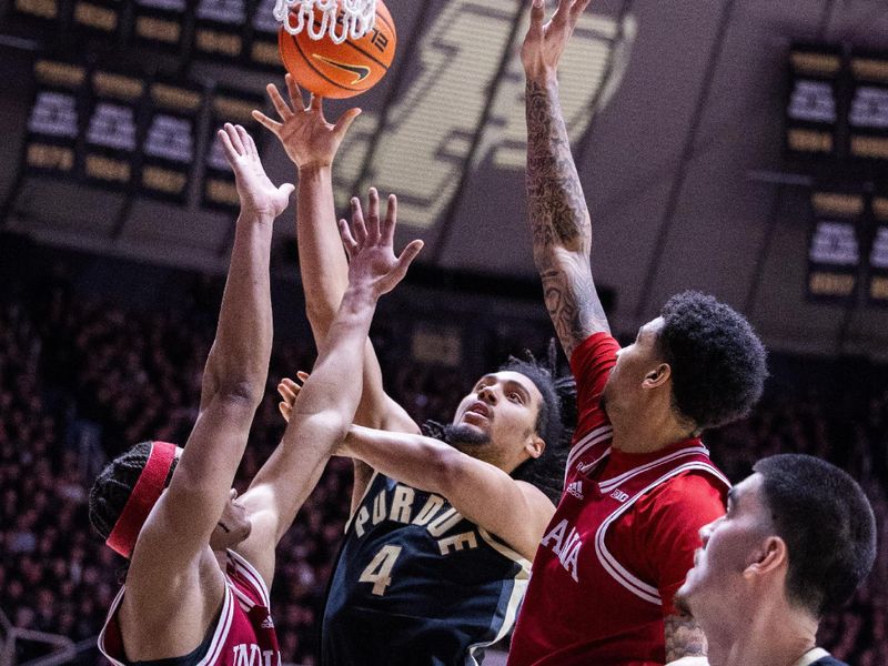 Feb 10, 2024; West Lafayette, Indiana, USA; Purdue Boilermakers forward Trey Kaufman-Renn (4) shoots the ball while Indiana Hoosiers forward Malik Reneau (5) defends in the second half at Mackey Arena. Mandatory Credit: Trevor Ruszkowski-USA TODAY Sports