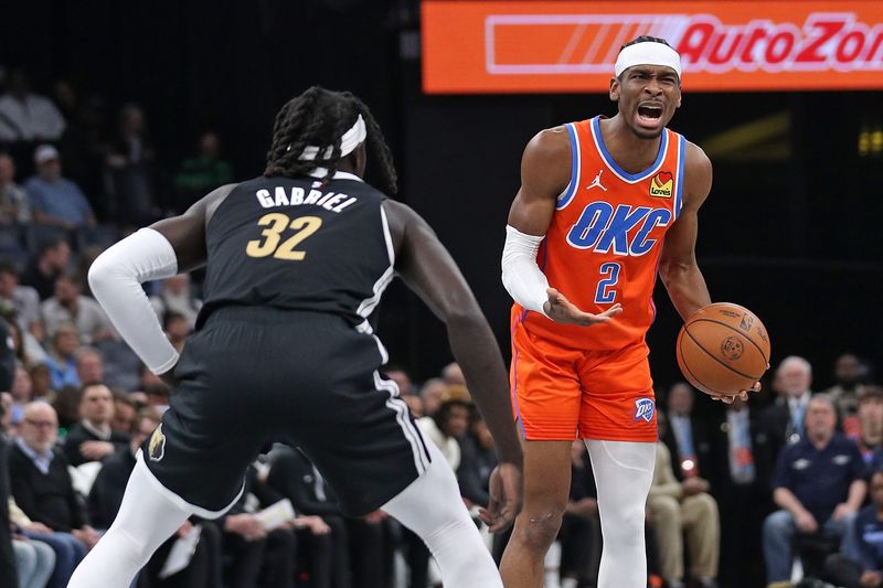 MEMPHIS, TENNESSEE - MARCH 16: Shai Gilgeous-Alexander #2 of the Oklahoma City Thunder reacts during the first half against Wenyen Gabriel #32 of the Memphis Grizzlies at FedExForum on March 16, 2024 in Memphis, Tennessee. NOTE TO USER: User expressly acknowledges and agrees that, by downloading and or using this photograph, User is consenting to the terms and conditions of the Getty Images License Agreement. (Photo by Justin Ford/Getty Images)