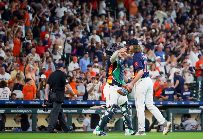 Jun 16, 2024; Houston, Texas, USA; Houston Astros catcher Yainer Diaz (21) and relief pitcher Josh Hader (71) celebrate after defeating the Detroit Tigers at Minute Maid Park. Mandatory Credit: Thomas Shea-USA TODAY Sports