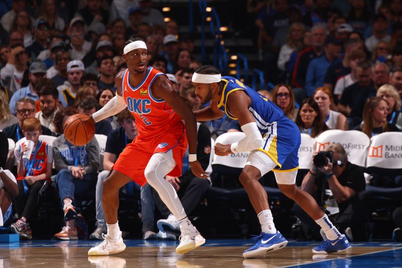 OKLAHOMA CITY, OK - NOVEMBER 10: Shai Gilgeous-Alexander #2 of the Oklahoma City Thunder dribbles the ball during the game against the Golden State Warriors on November 10, 2024 at Paycom Center in Oklahoma City, Oklahoma. NOTE TO USER: User expressly acknowledges and agrees that, by downloading and or using this photograph, User is consenting to the terms and conditions of the Getty Images License Agreement. Mandatory Copyright Notice: Copyright 2024 NBAE (Photo by Zach Beeker/NBAE via Getty Images)