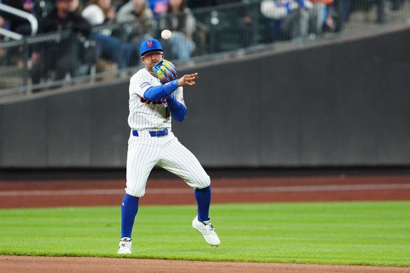 Apr 30, 2024; New York City, New York, USA; New York Mets shortstop Francisco Lindor (12) throws to second to get a force out after fielding a ground ball hit by Chicago Cubs first baseman Patrick Wisdom (not pictured) during the fifth inning at Citi Field. Mandatory Credit: Gregory Fisher-USA TODAY Sports