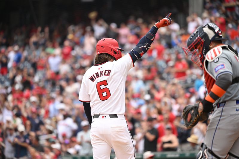 Jul 4, 2024; Washington, District of Columbia, USA; Washington Nationals left fielder Jesse Winker (6) celebrates at home plate after hitting a home run against the New York Mets during the eighth inning at Nationals Park. Mandatory Credit: Rafael Suanes-USA TODAY Sports