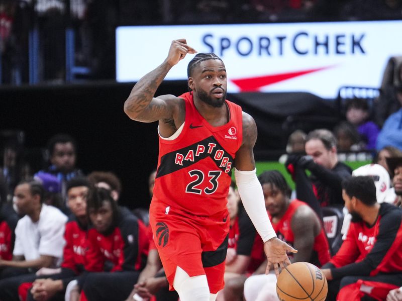 TORONTO, ON - JANUARY 1: Jamal Shead #23 of the Toronto Raptors dribbles against the Brooklyn Nets during the second half of their basketball game at the Scotiabank Arena on January 1, 2025 in Toronto, Ontario, Canada. NOTE TO USER: User expressly acknowledges and agrees that, by downloading and/or using this Photograph, user is consenting to the terms and conditions of the Getty Images License Agreement. (Photo by Mark Blinch/Getty Images)